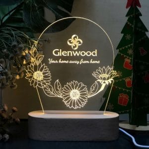 đèn led kỷ niệm chương đế gỗ teak sử dụng pin hoặc điện khắc laser logo và nội dung theo yêu cầu: mẫu hướng dương