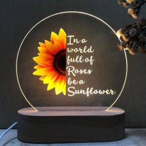 đèn led kỷ niệm chương đế gỗ teak sử dụng pin hoặc điện khắc laser logo và nội dung theo yêu cầu: mẫu một nửa hoa hướng dương